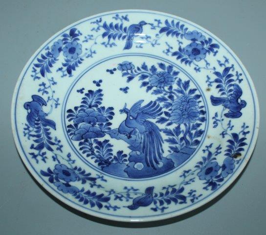 A Japanese Arita blue and white plate, 18th century, 22cm(-)